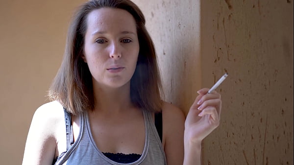 Brunette Smoking Tease with Intense Eye Contact