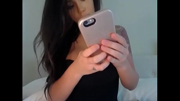 Brunette big tits front on cam