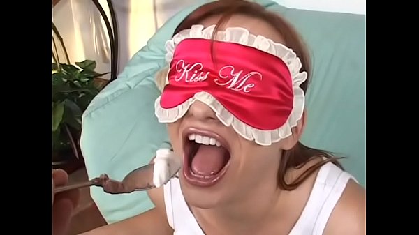 Slutty redhead Katja Kassin is sucking a white and a black cock