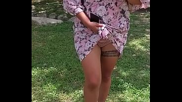 Arelyb showing her panties and tits in a public park in Mexico