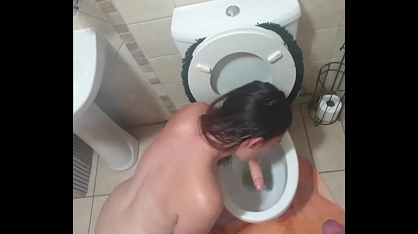 Human toilet drinks piss and licks dildo dipped in toilet