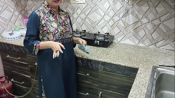 Download Video - Stepmom seduces her stepson for the hardcore fucking in the kitchen in hindi audio