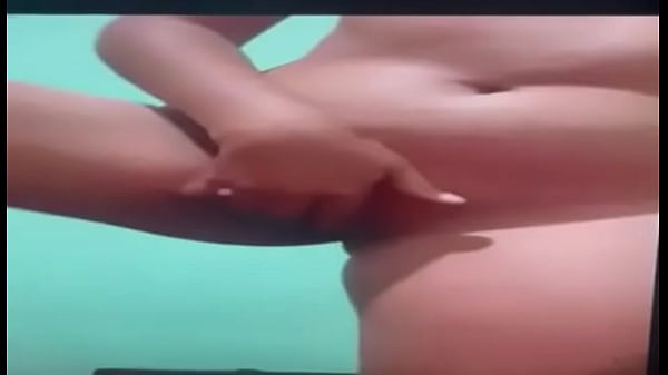 Latina enjoying herself in front of the camera to get really wet