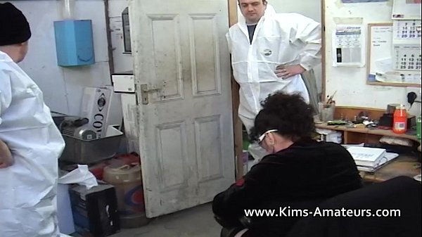 Busty Kim sucks off two workers