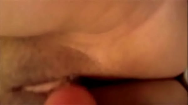 Fucking her pussy with a dildo closeup