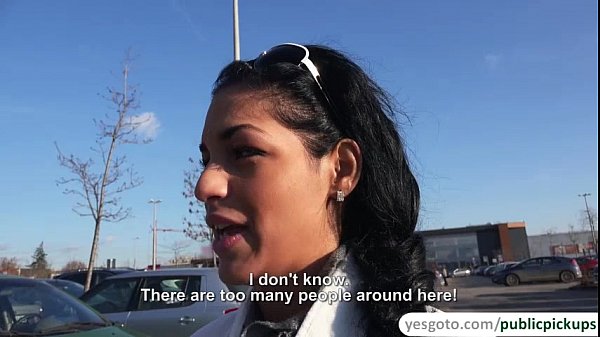 Sexy brunette babe Nancy reveals her perfect tits in a parking lot