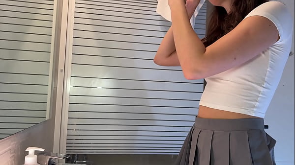 Download Video - Long legs hot college girl Alicia in her plaid school uniform mini skirt and stockings in the bathroom