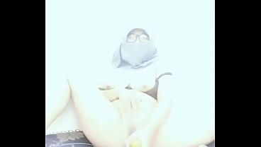 Playing with the vagina using cucumber to get pleasure and satisfaction