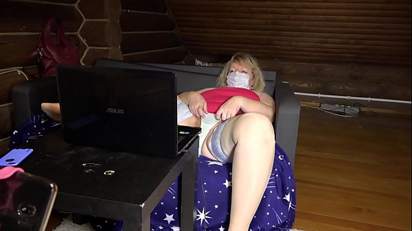 A mature housewife in a sex chat shows a friend her appetizing chubby figure: legs in stockings, a big ass under a skirt and panties. Homemade fetish and foot fetish.