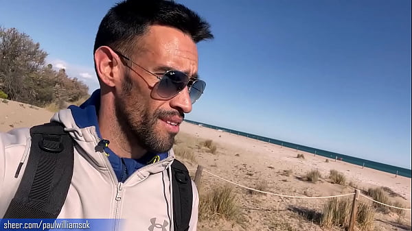 Download Video - Gym trainer gets naked on a public beach in Spain