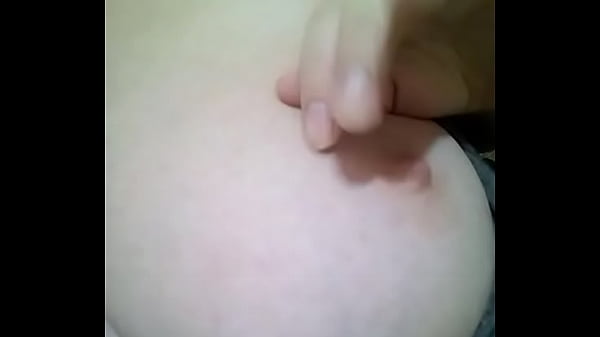 Branquinha smoothing her chest