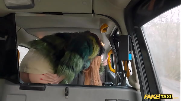 Fake Taxi Redhead MILF in sexy nylons rides a big fat dick in a taxi