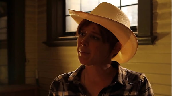 Tattooed babe gets her shaved pussy pleased by a girl with short hair on the sofa