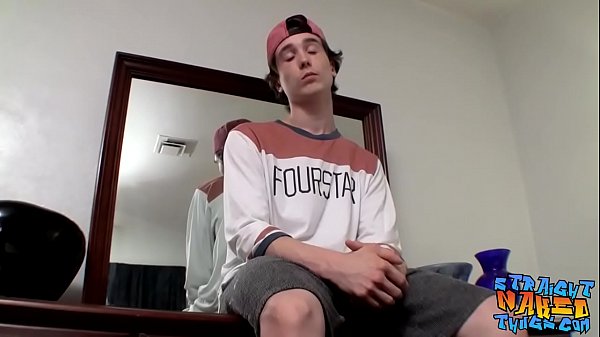 Skinny straight thug with tattoos grabs his dic...