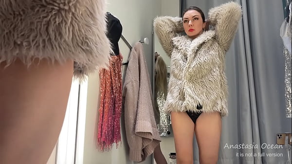 Fitting room. Hot slut tries on clothes on her hot body in a public place. Public. Shopping center.