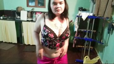 The plump girl dances, strips, and masturbates with the mechanic music