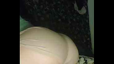 A hot, curvy woman playing with her dildo.