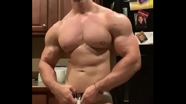 Muscle jock flexing, posing, stroking cock & ta...