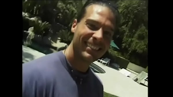 A long-haired chic bitch is happy to suck a dick to a muscular male on a sun lounger near the pool and then substitutes a round ass under his hard rod