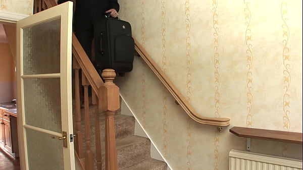 Sexy European blonde with big boobs, Paige Ashley, gets it on with a man on a staircase,...