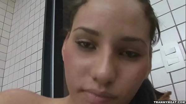 Tranny has big tits and a big cock that she pul...