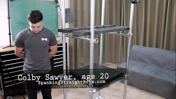Download Video - Young Masculine Hunk Spanked in a Bondage Contraption