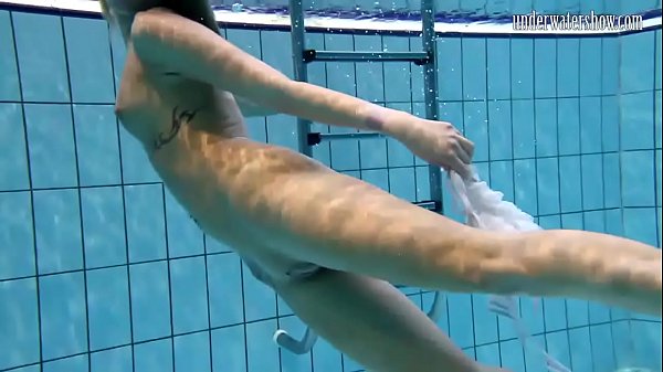 Sexy blonde Monica gets horny in the pool