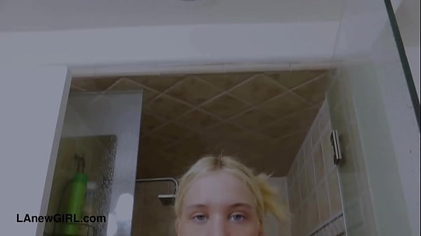 Attractive blonde model took a shower