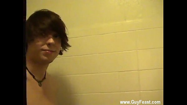 Sexy men He lathers up and scrubs his smooth, t...