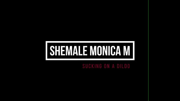 Shemale Monica M – sucking on a dildo