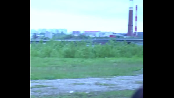 A beauty with a tattoo shows her tits