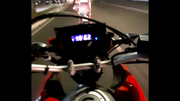 Girl in a mini skirt on a motorcycle
