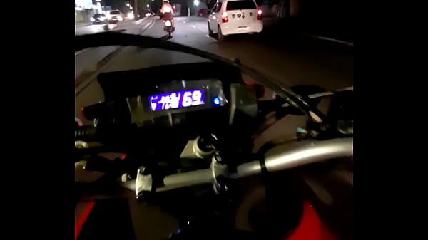 Girl in a mini skirt on a motorcycle