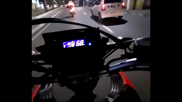 Girl in a mini skirt on a motorcycle
