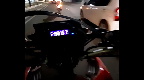 Girl in a mini skirt on a motorcycle