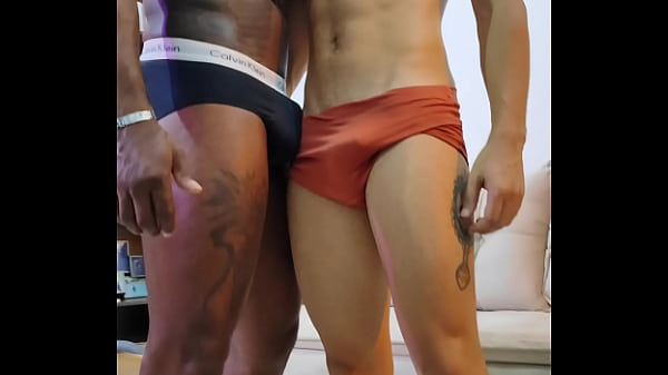 The big black guy giving it to the tattooed top