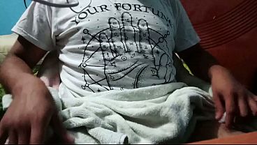 boy in towel touches himself after bath 