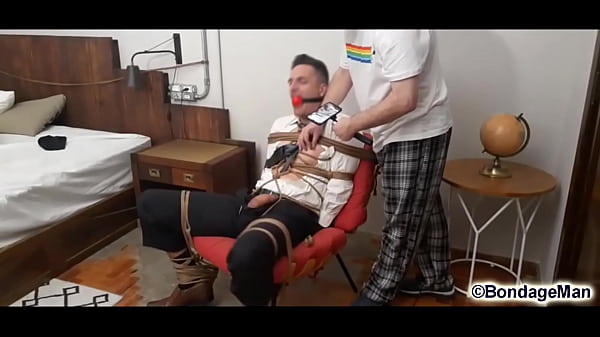 Samuel Hodecker in suit tied up and gagged cum ...