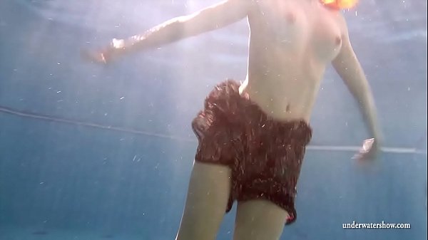 Big tits brunette Mia underwater naked