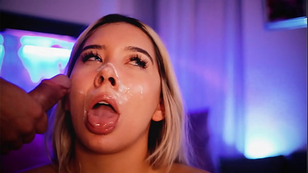 Blonde with a beautiful face sucks her friend's cock while transmitting and receives a big load of cum on her face