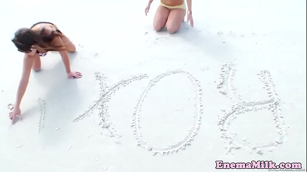 Showering enema babes playing with dildo
