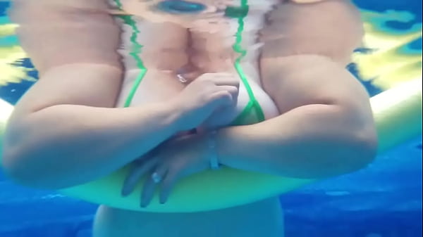 BBW big tits look great while she swims in her micro bikini