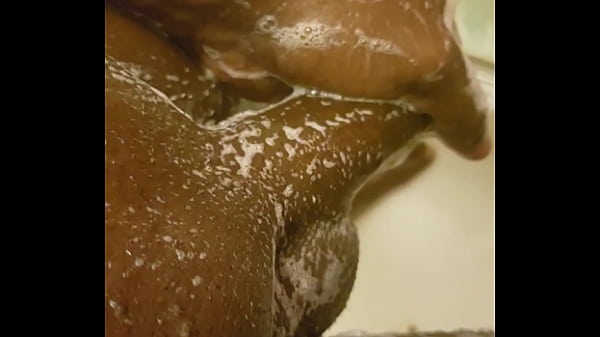 Stroking black dick in shower