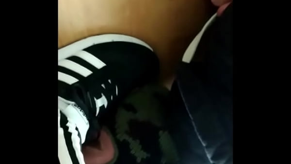 licking sneakers