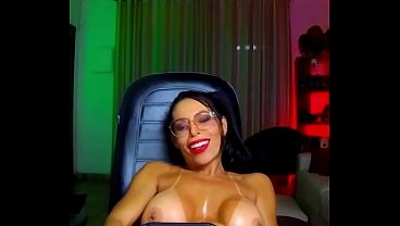 A brunette with glasses is telling you not to look away for even a second.