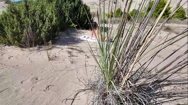 Stranger on a Nudist Beach