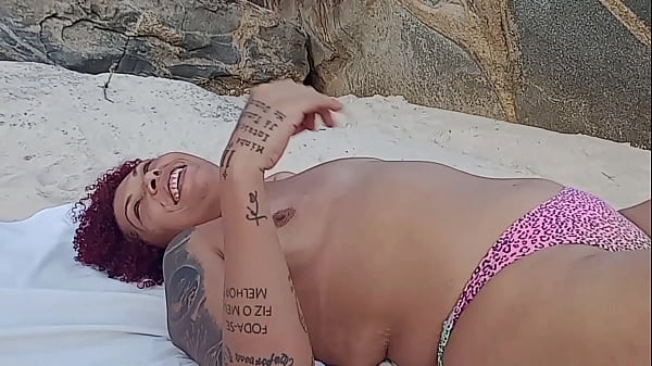 Showing off on the beach and in the end the black guy sucked on the rocks