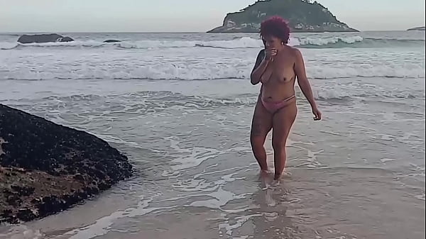 Showing off on the beach and in the end the black guy sucked on the rocks