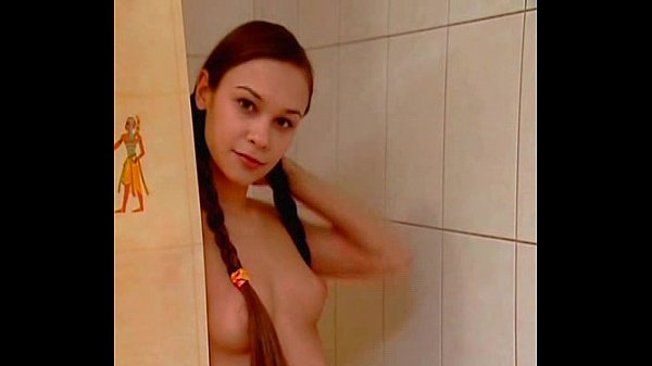 Beautiful teen takes a shower