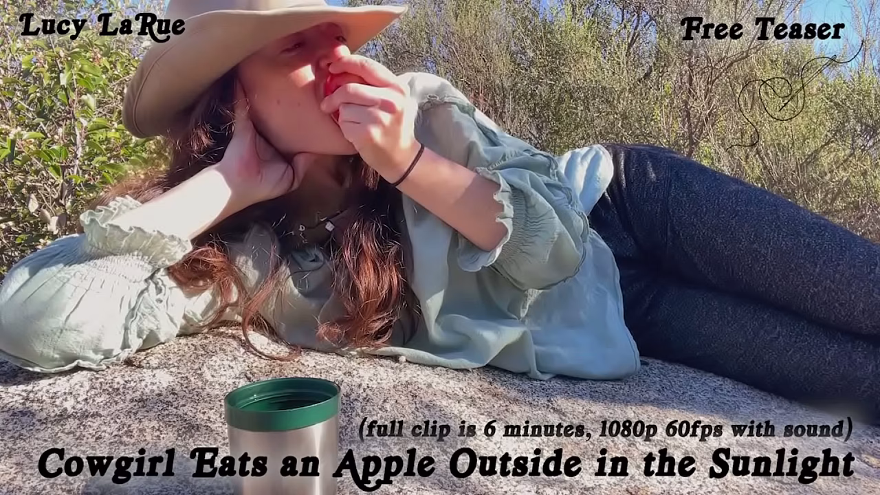 &quot_Cowgirl Eats an Apple Outside in the Sunlight&quot_